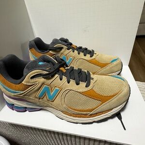 Size 11 men’s- New Balance 2002R incense, slightly worn but no noticeable usage